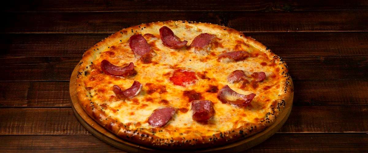 3. ¿Cuáles son los precios medios de las pizzas en las pizzerías de Toledo?