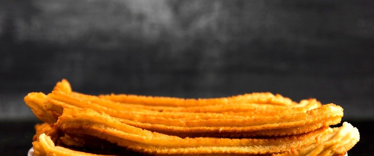 ¿Cuál es el acompañamiento más popular para los churros en Tarragona?