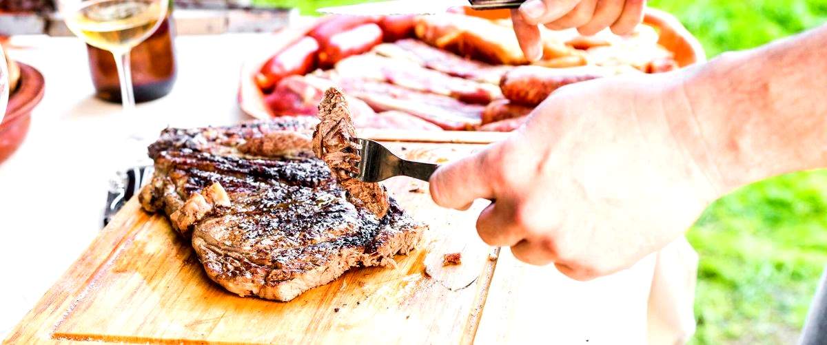 ¿Cuál es el precio medio de una comida en un asador en Elche?